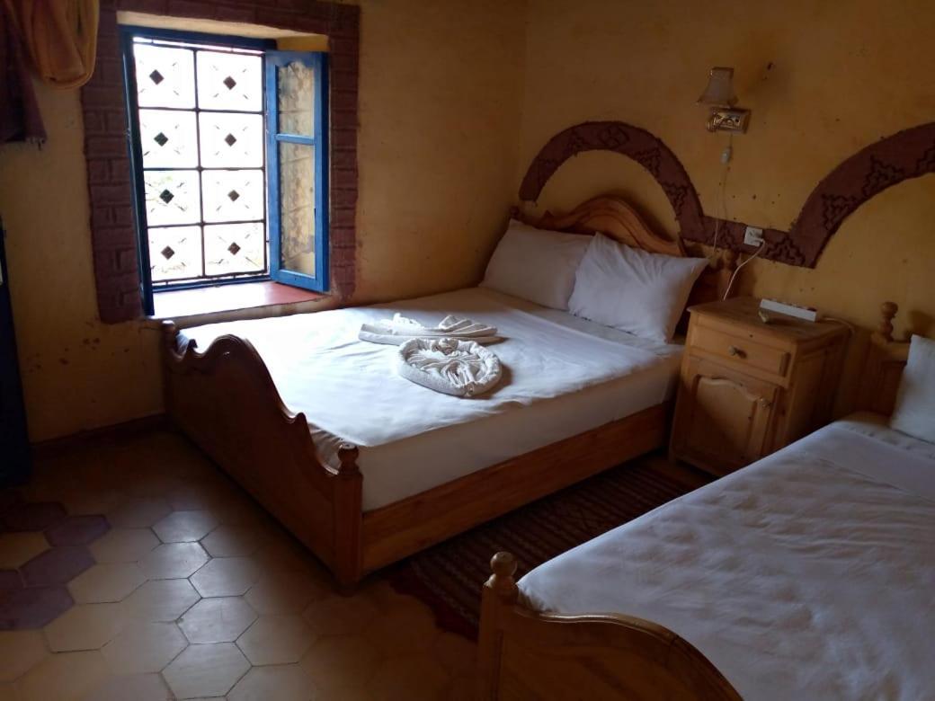 Les Pyramides Hotel Мерцуга Екстериор снимка